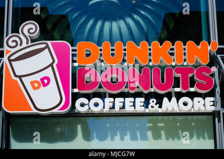 Berlin, Germany - may, 2018: The logo of Dunkin`Donuts Coffee and More in Berlin, Germany. Stock Photo